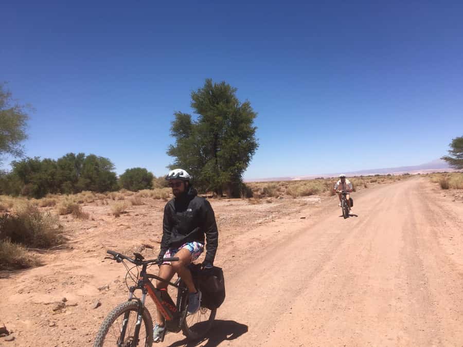 From San Pedro de Atacama: Laguna Cejar E-biking Adventure - Arriving at Laguna Cejar’s salty water
