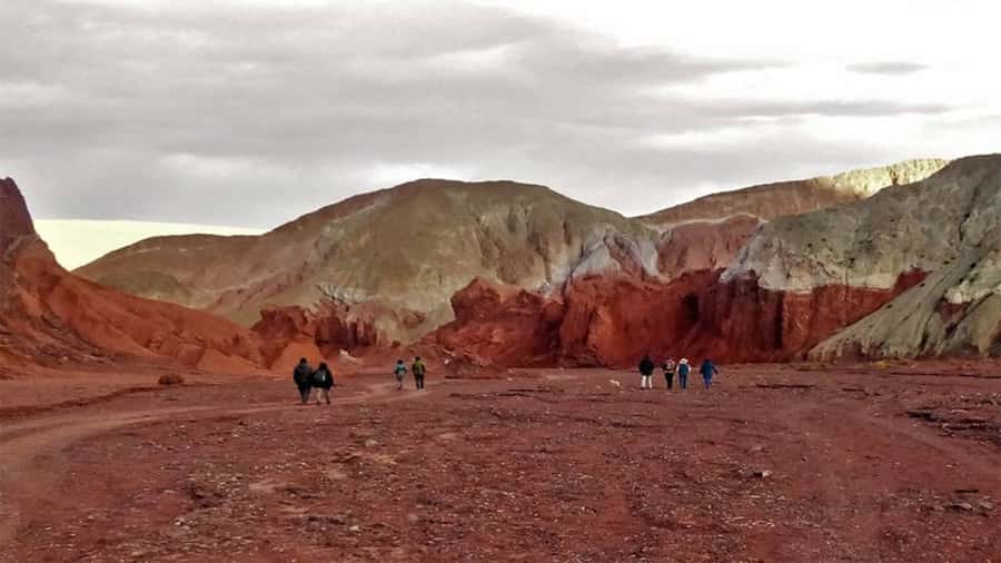 From San Pedro de Atacama: Rainbow Valley Tour - Yerbas Buenas brings ancient marks and big mountain views