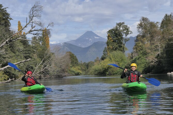 Guided Kayak Trip on Liucura River - Getting ready: wetsuits, helmets, and sit-on-top kayaks