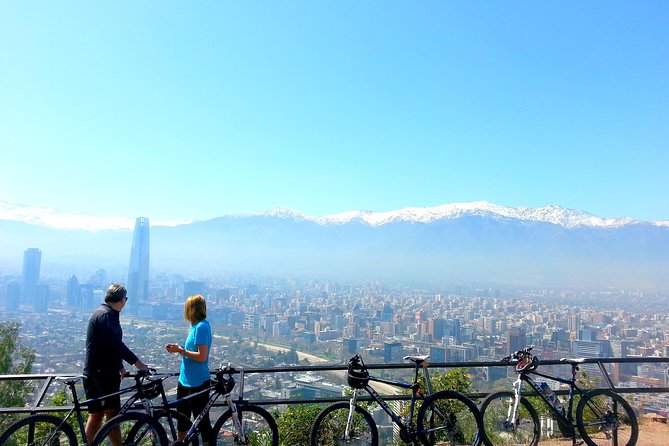 Private San Cristobal Hill & Metropolitan Park Santiago Bike Tour - Climbing into Metropolitan Park