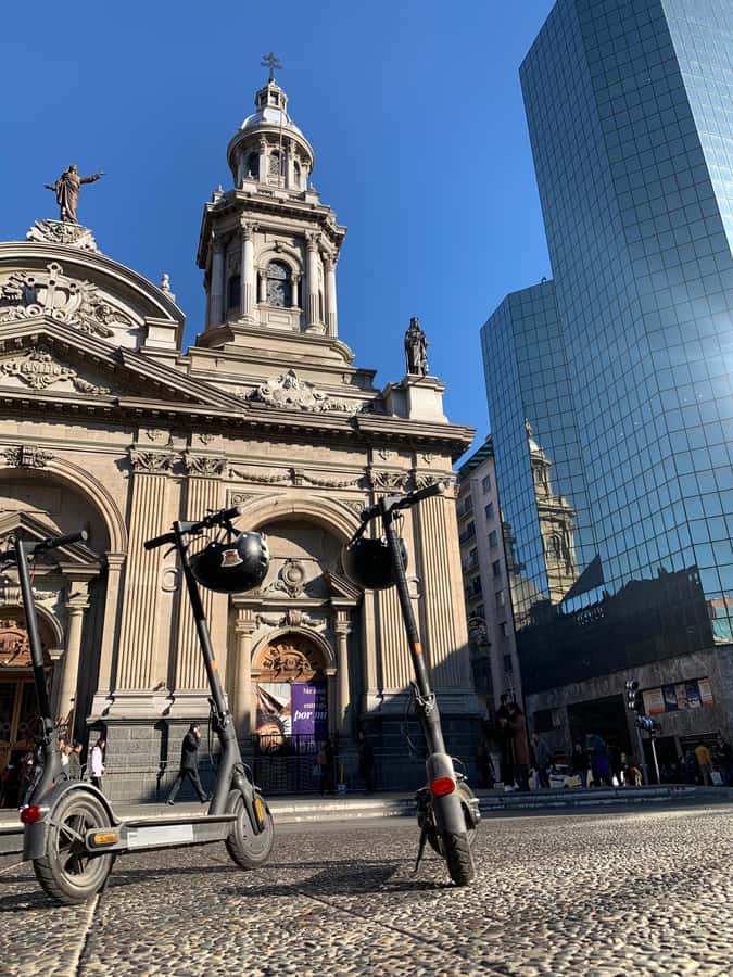 Santiago: Electric Scooter City Tour with Lunch - Riding the Alameda to La Moneda